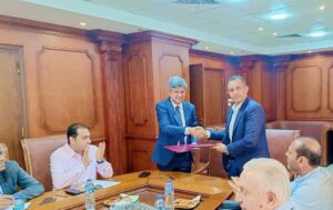 جهاز دمياط الجديدة يوقع مع الغرفة التجارية لتطوير المنشآت التابعة