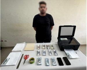 ضبط شاب تخصص في تزييف وترويج العملات الأجنبية المقلدة بالدقي