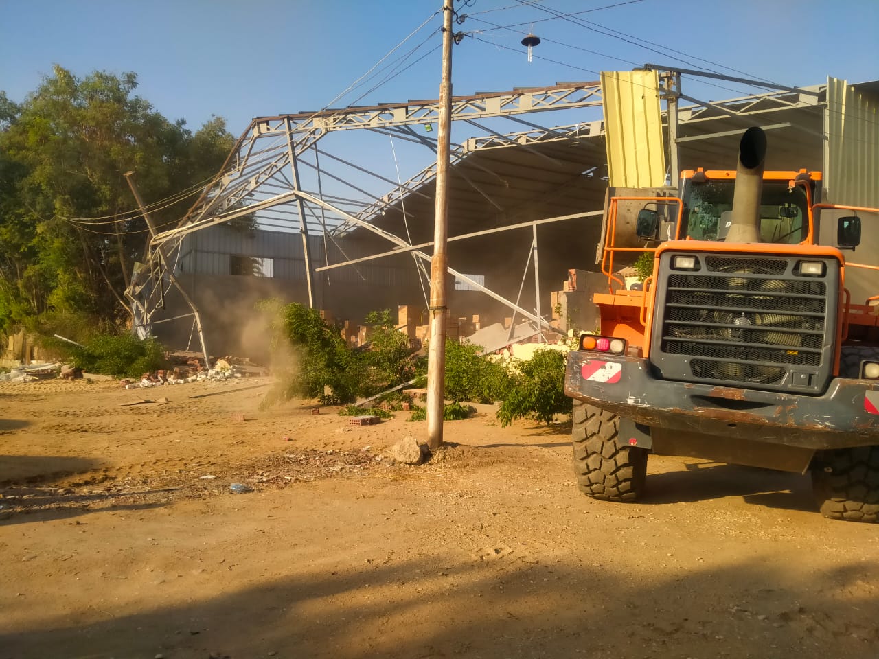 إزالة تعديات على مساحة ٢٥ ألف م² ضمن أعمال الموجة ٢٧ بالجيزة