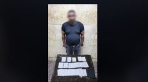 ضبط شخص يحاول توزيع كروت دعائية انتخابية بالأقصر