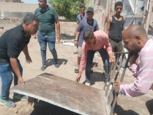 الأنصاري: إخلاء وغلق مخازن فرز وخردة بمنطقة الإخلاص بالطالبية والتحفظ على 14 مركبة ومعدة