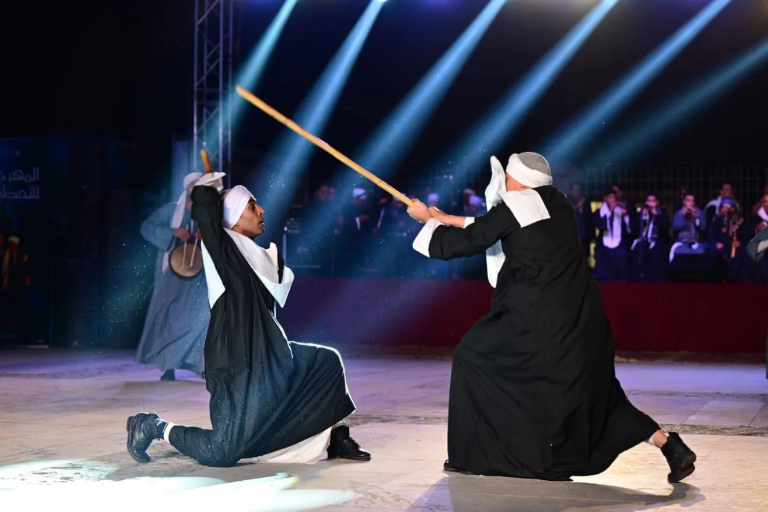 “التحطيب” تراث شعبي موروث بمولد الفرغل في أسيوط